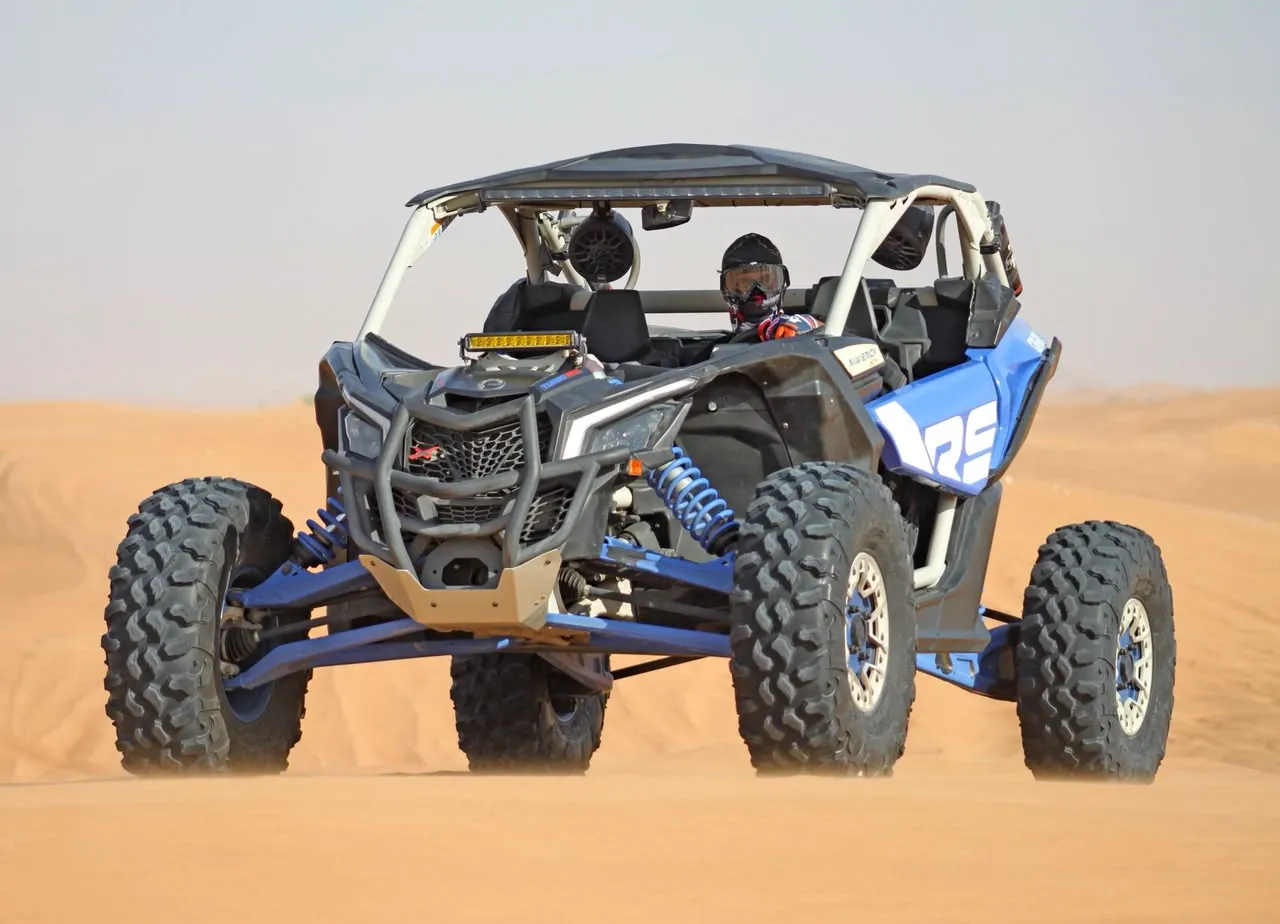 Can-Am Maverick X3 4-seater dune buggy on a guided Dubai desert tour