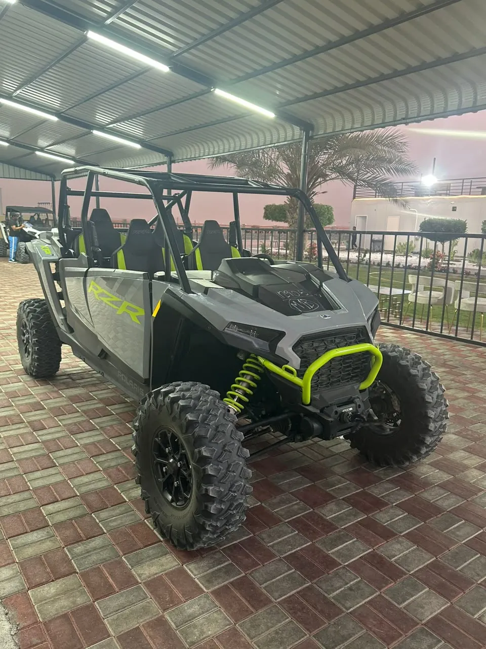 Polaris RZR 4-seater dune buggy parked at the Buggy Rents Dubai base